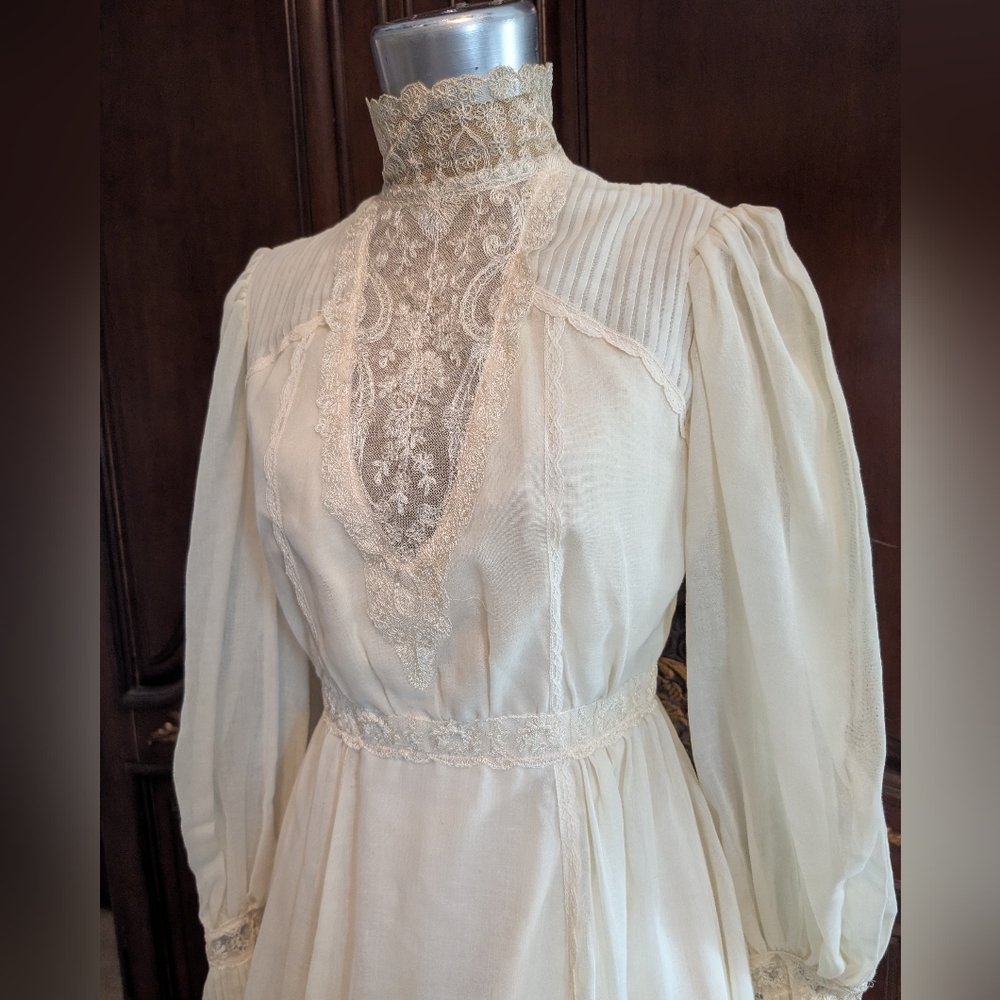 Amazing vintage Prairie boho High necked wedding dress with train.